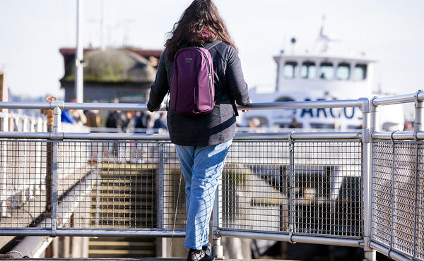A person carrying the Luminary 15 at a wharf.